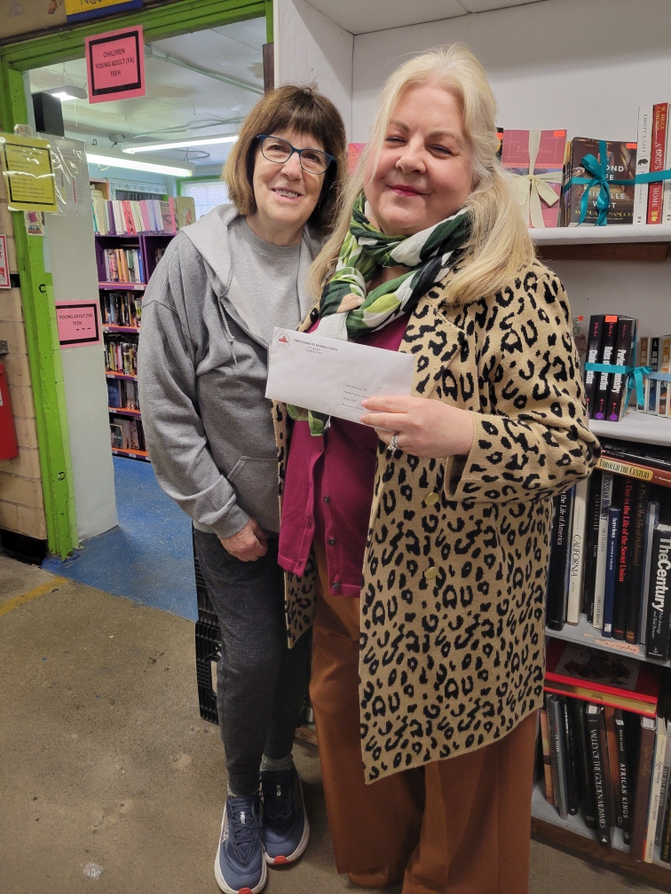 Visitors browsing inside the Book Barn